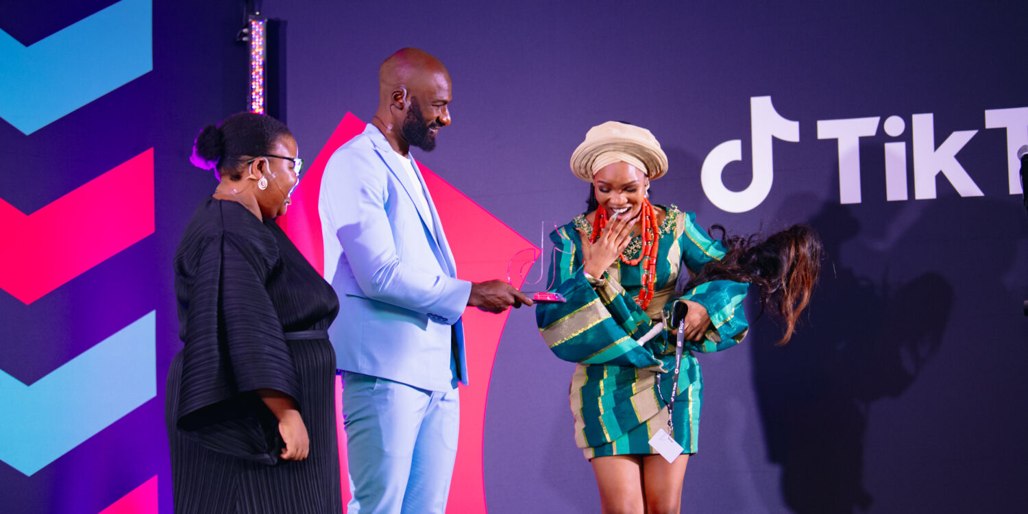 03 - Dennis Ombachi (TikTok Top Creator overall winner 2022) handing award to _iremide (Nigeria) Lifestyle and Education Creator of the Year in Sub-Saharan Africa