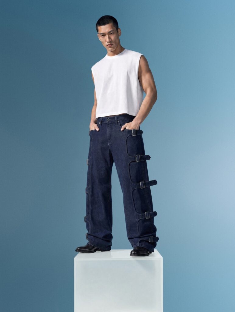 The Denim Tombogo MEN front hands in pockets